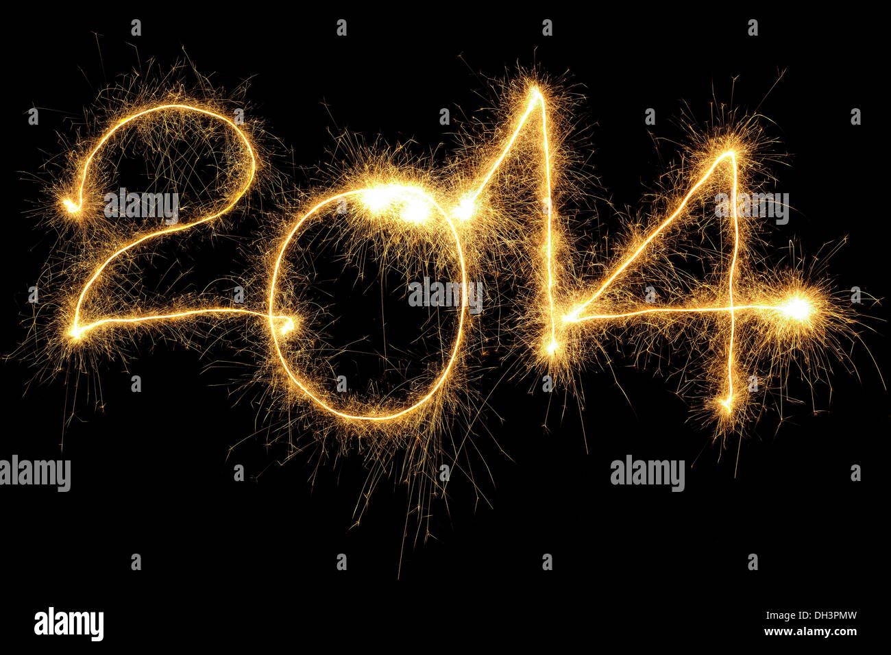 New Year 2014 formed from sparking digits over black background Stock Photo