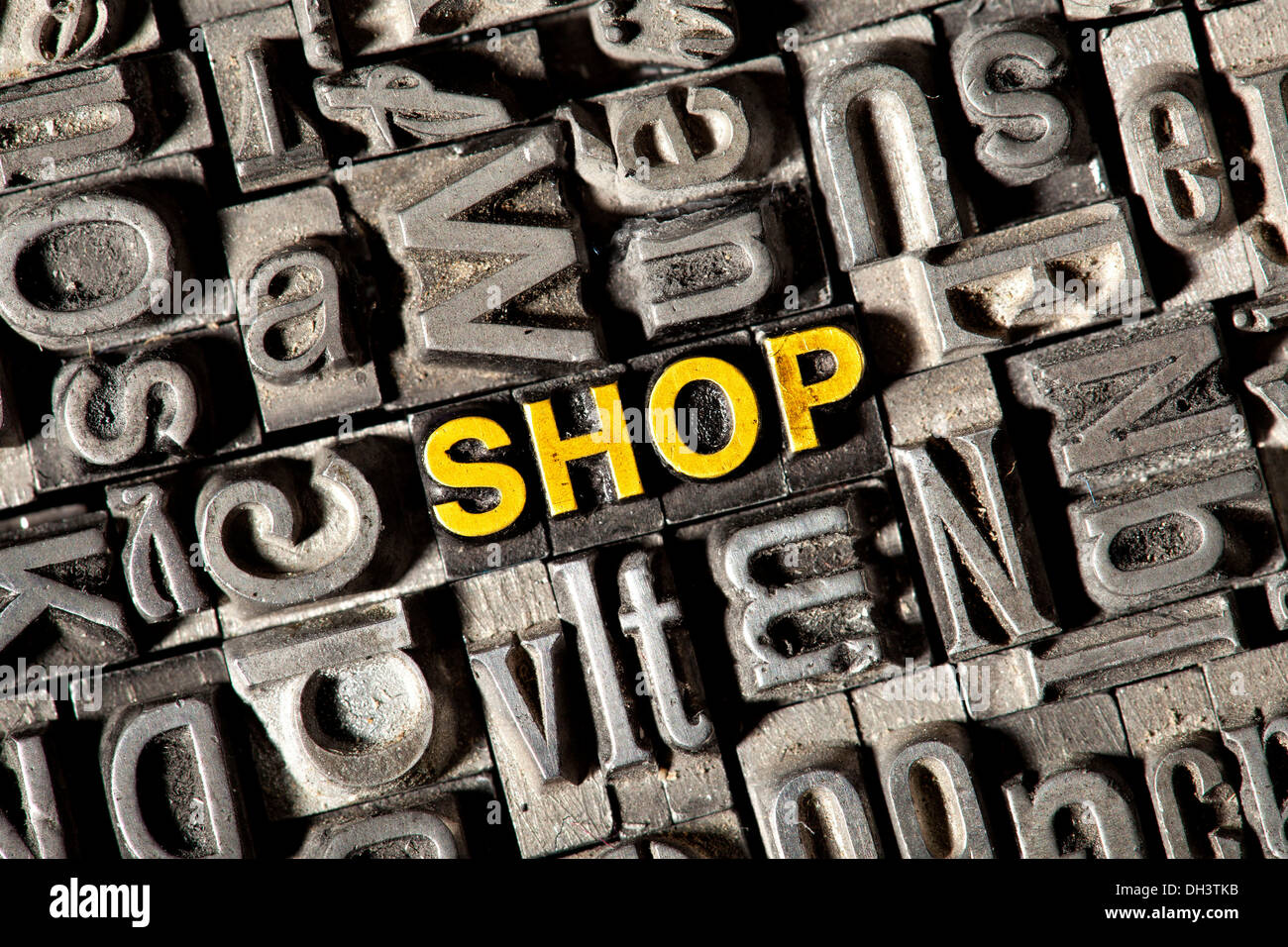 Old lead letters forming the word 'SHOP' Stock Photo