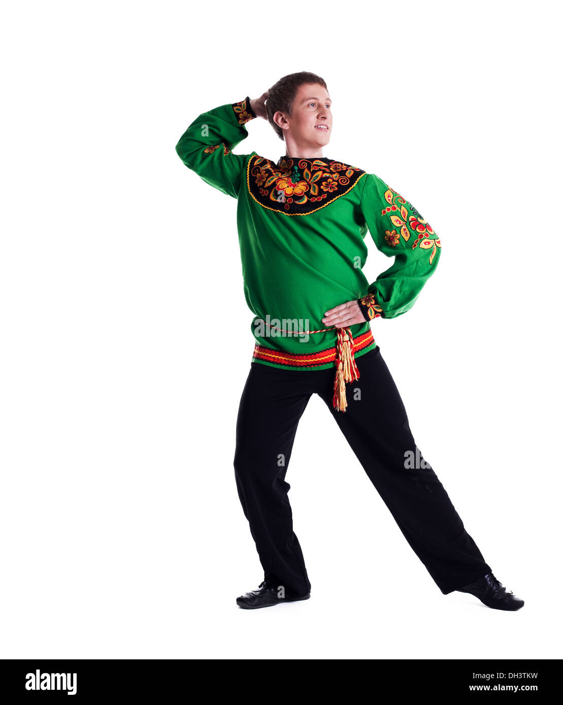 Cheerful man performing folk dance in studio Stock Photo Alamy