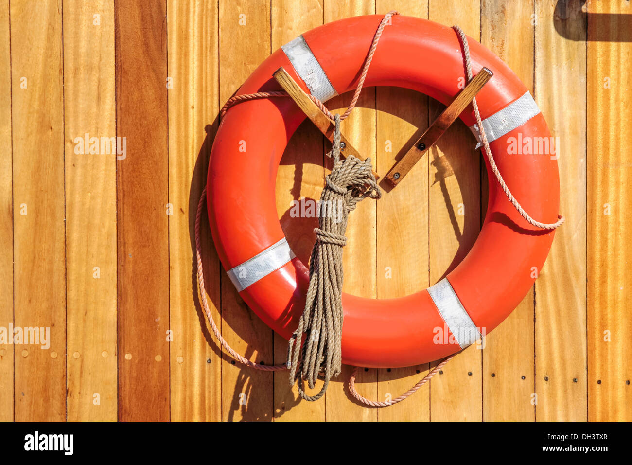 Orange lifebuoy on old sailing ship in Amaliehaven, Copenhagen, Denmark Stock Photo