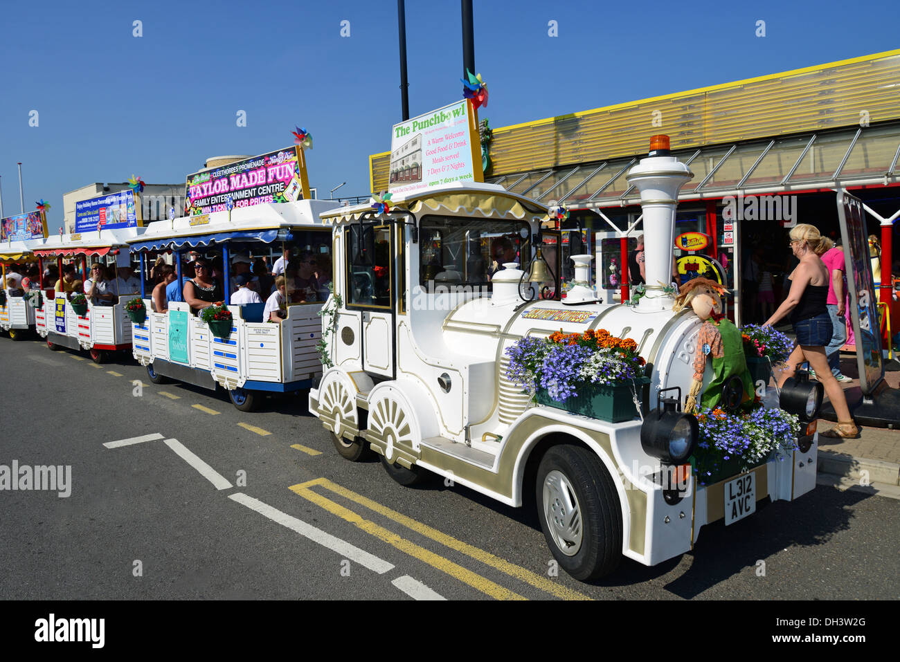 'Lollipop Express' electric train on beach promenade, Cleethorpes Beach, Cleethorpes, Lincolnshire, England, United Kingdom Stock Photo