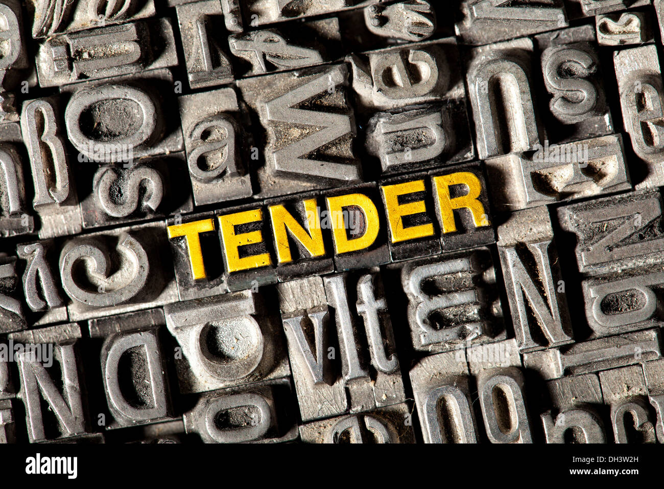 Old lead letters forming the word 'TENDER' Stock Photo