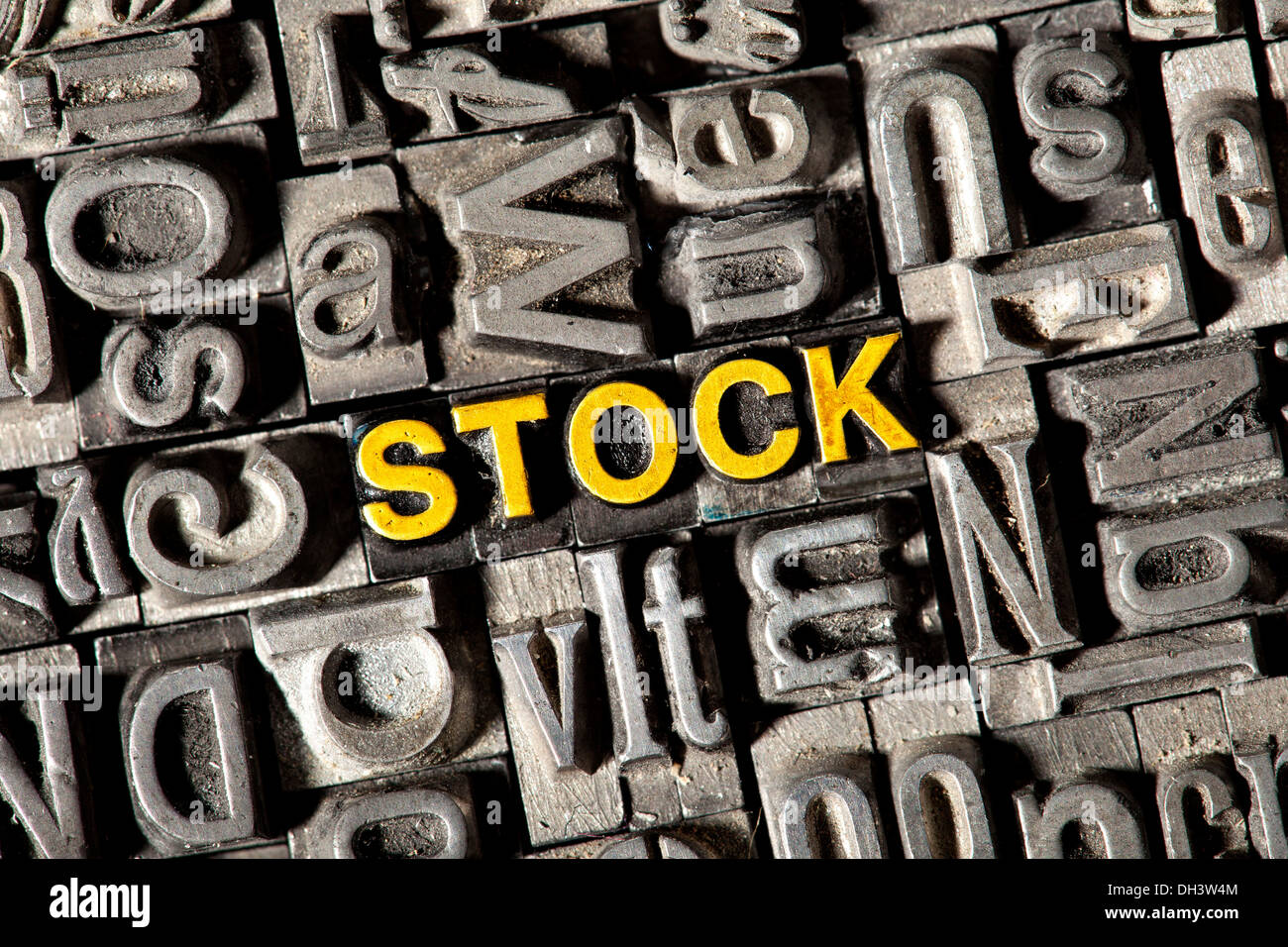 Old lead letters forming the word 'STOCK' Stock Photo