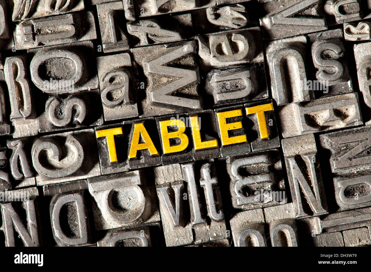 Old lead letters forming the word 'TABLET' Stock Photo