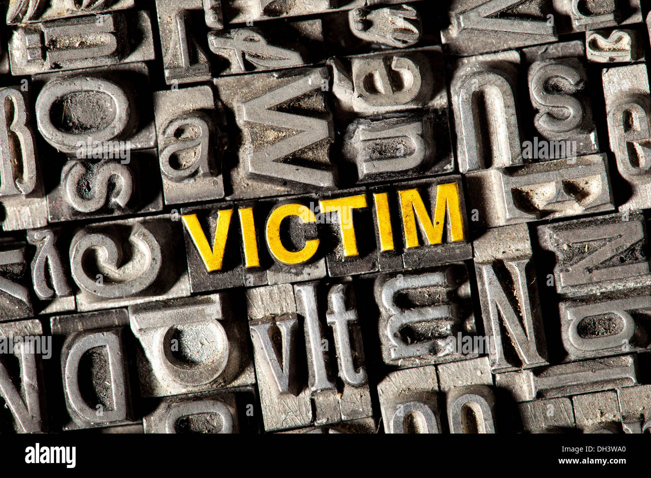 Old lead letters forming the word Victim Stock Photo Alamy
