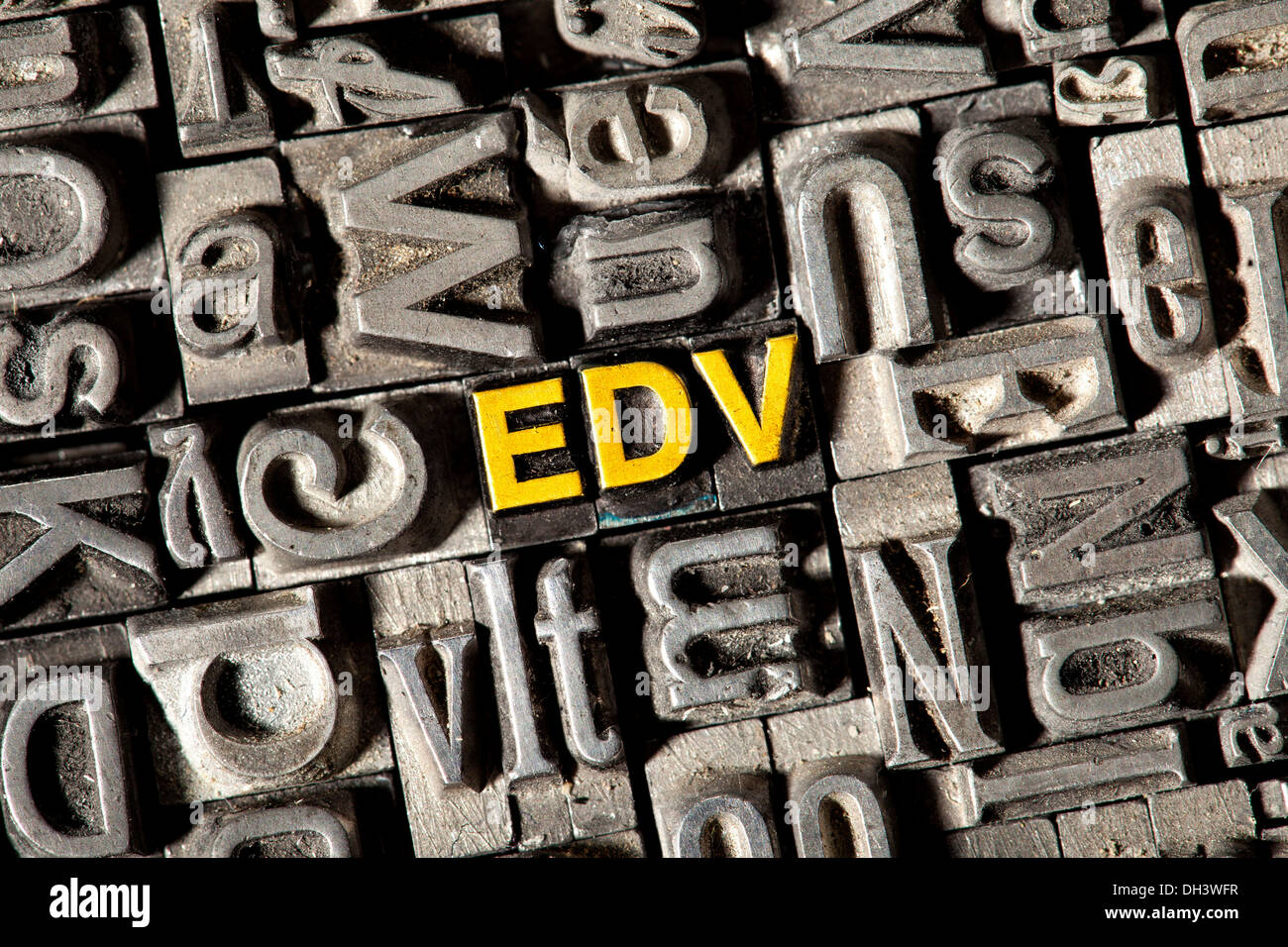 Old lead letters forming the abbreviation EDV Stock Photo