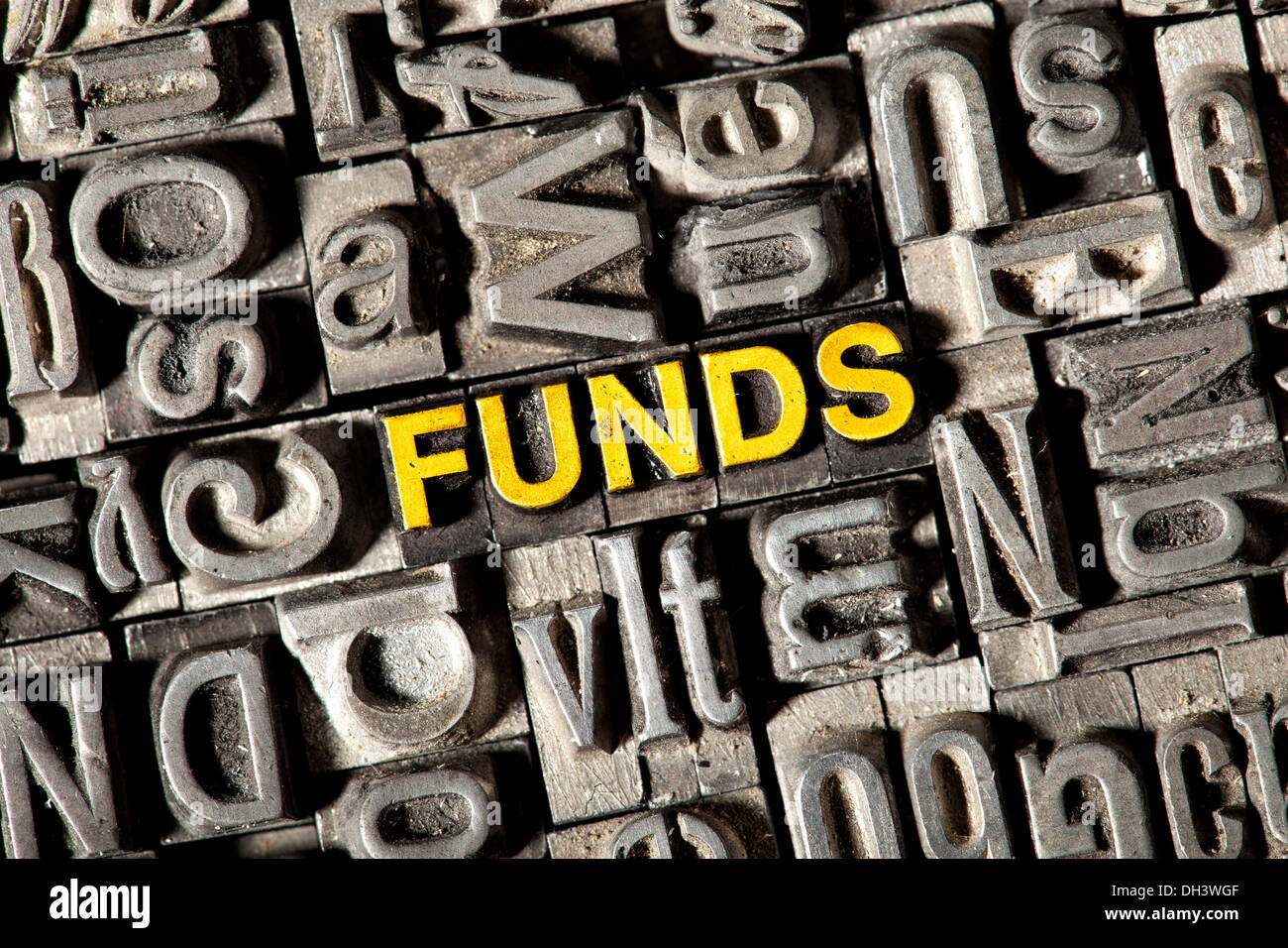 Old lead letters forming the word Funds Stock Photo