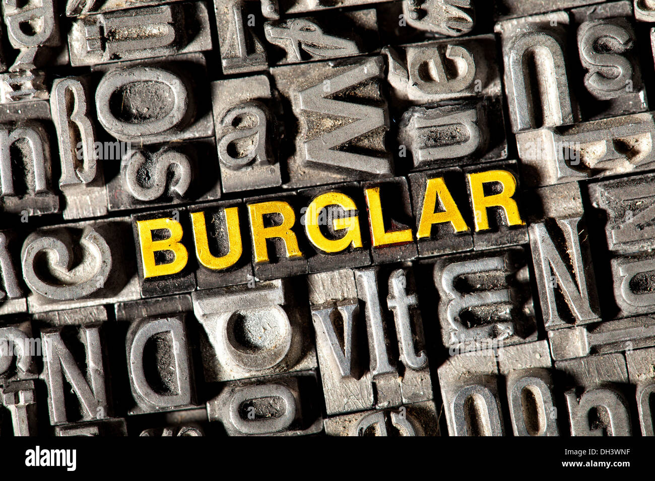 Old lead letters forming the word Burglar Stock Photo Alamy