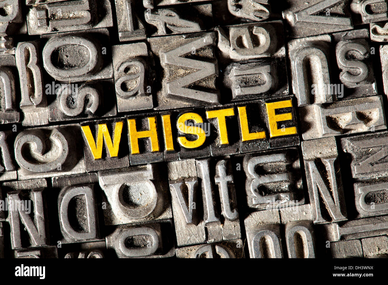 Old lead letters forming the word Whistle Stock Photo Alamy