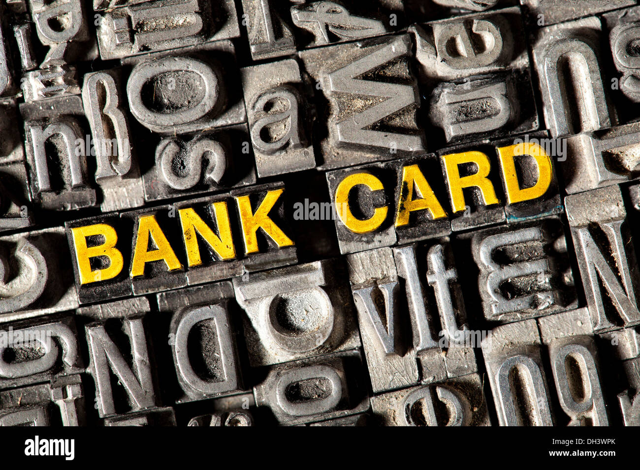 Old lead letters forming the words 'BANK CARD' Stock Photo