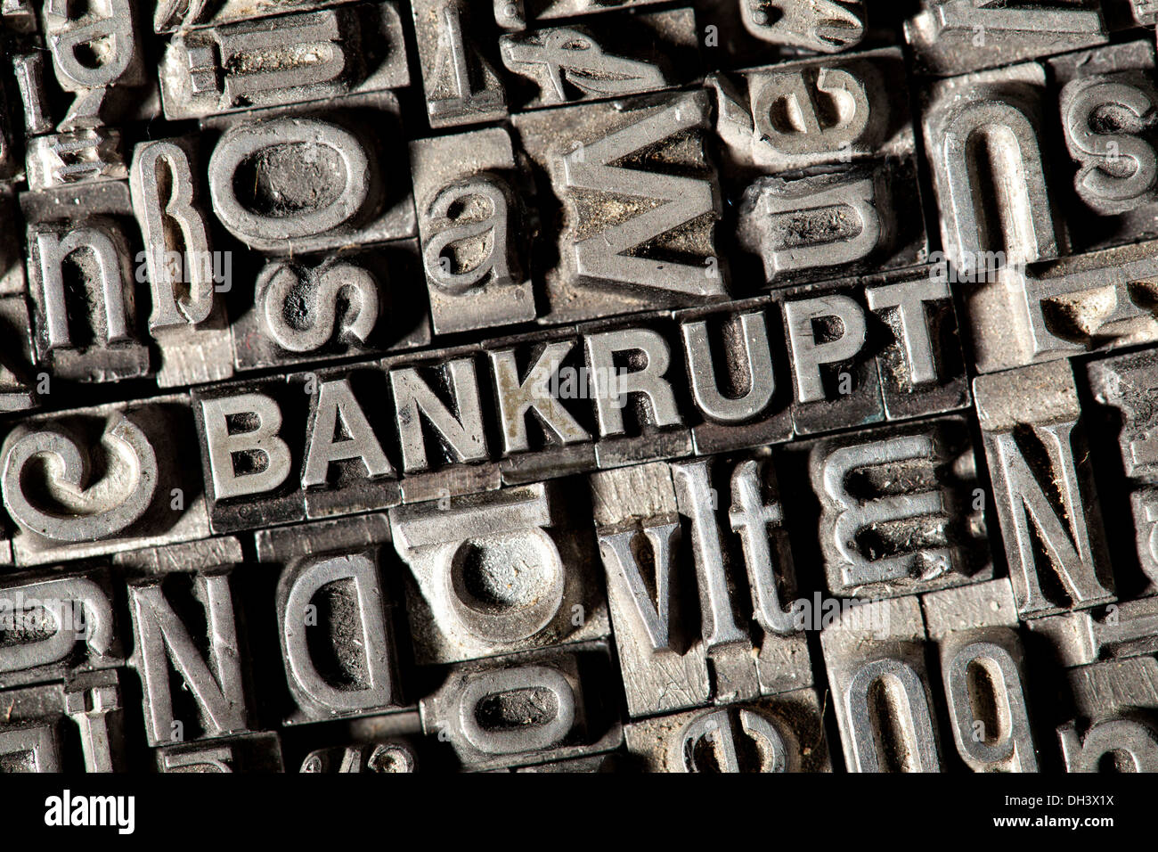 Old lead letters forming the word 'BANKRUPT' Stock Photo