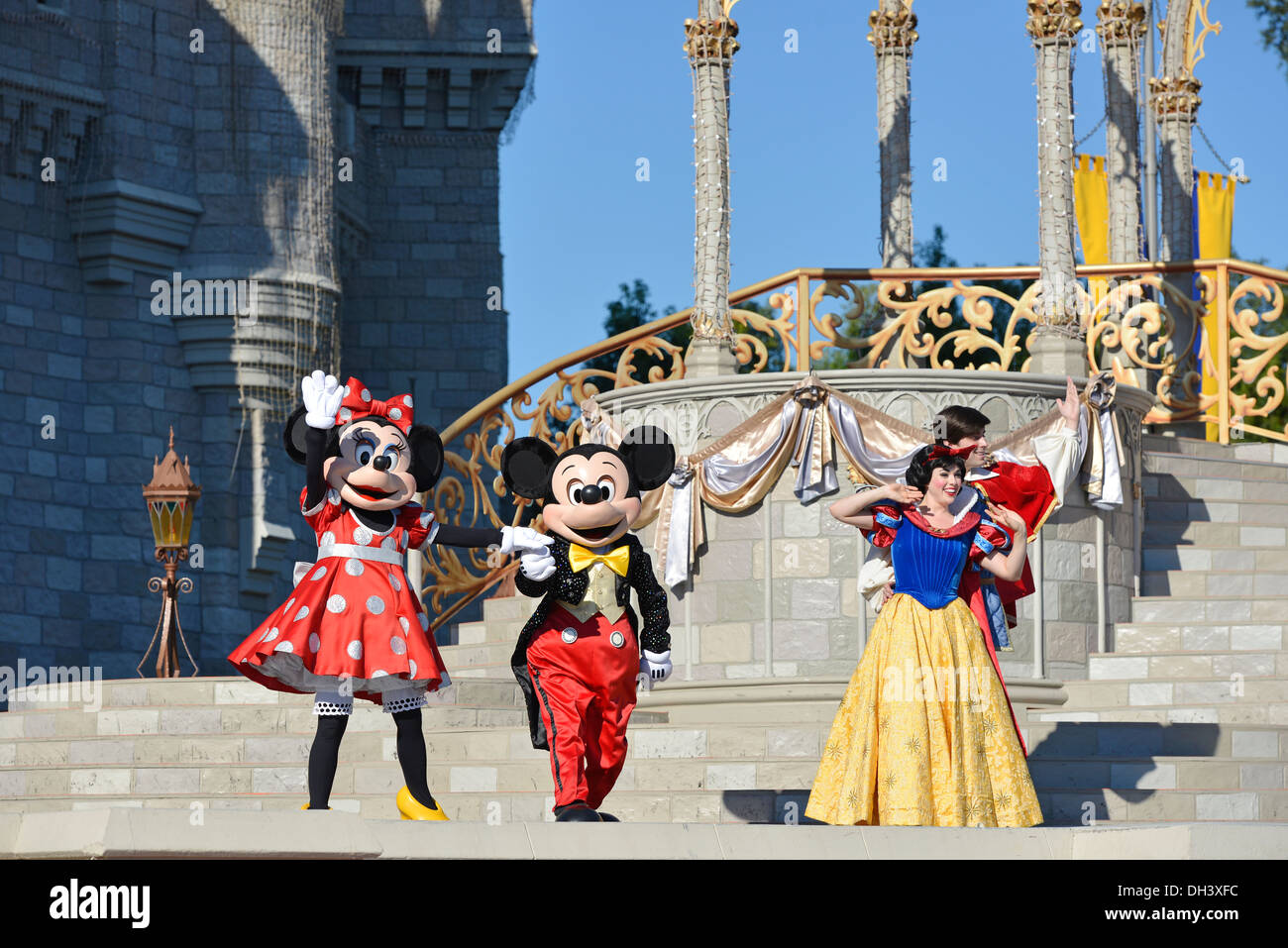Mickey Mouse Minnie Snow White and Prince, Dream Along Show, in front of Cinderella Castle, Magic Kingdom, Disney World, Florida Stock Photo