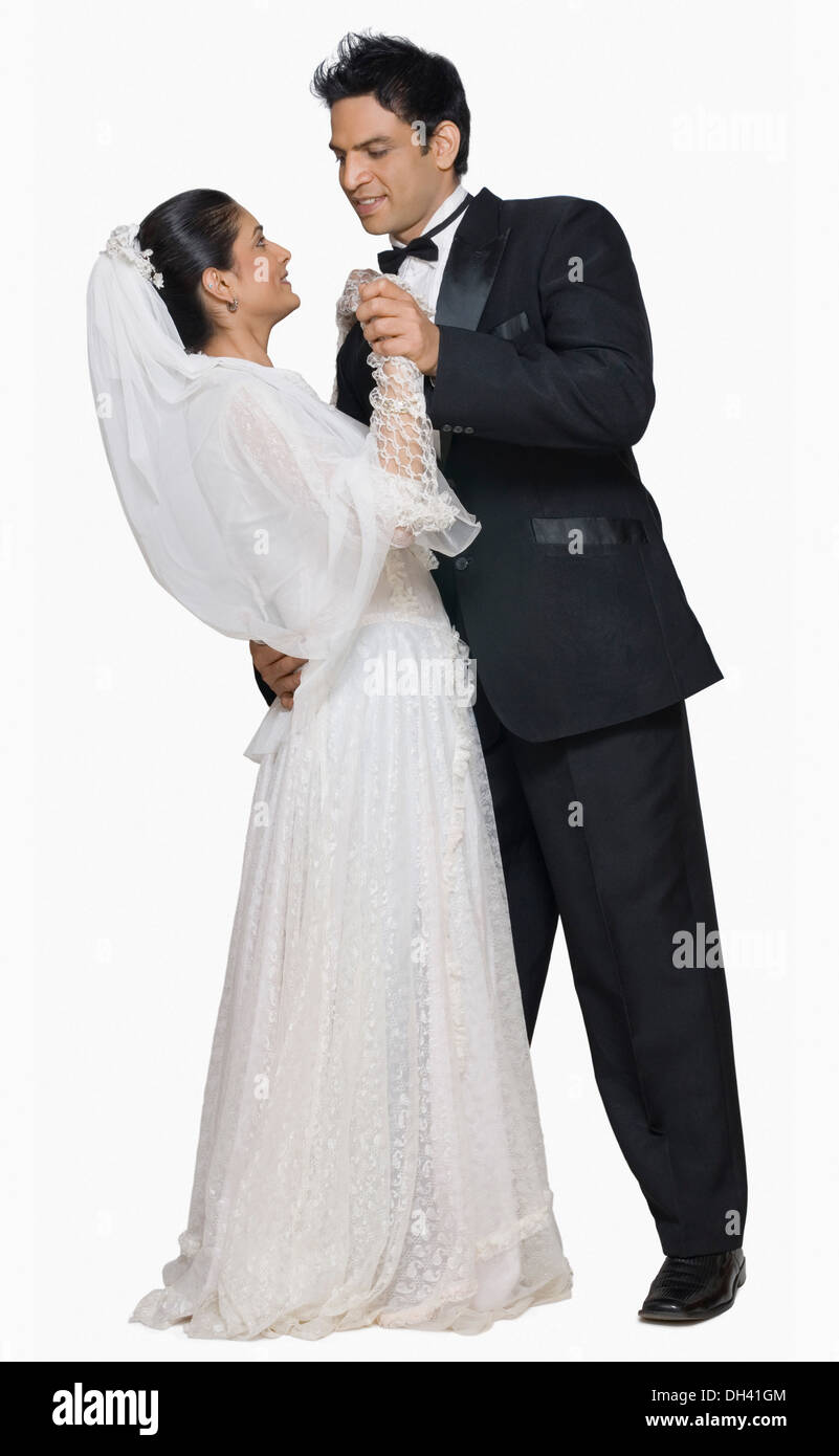 Newlywed couple dancing Stock Photo
