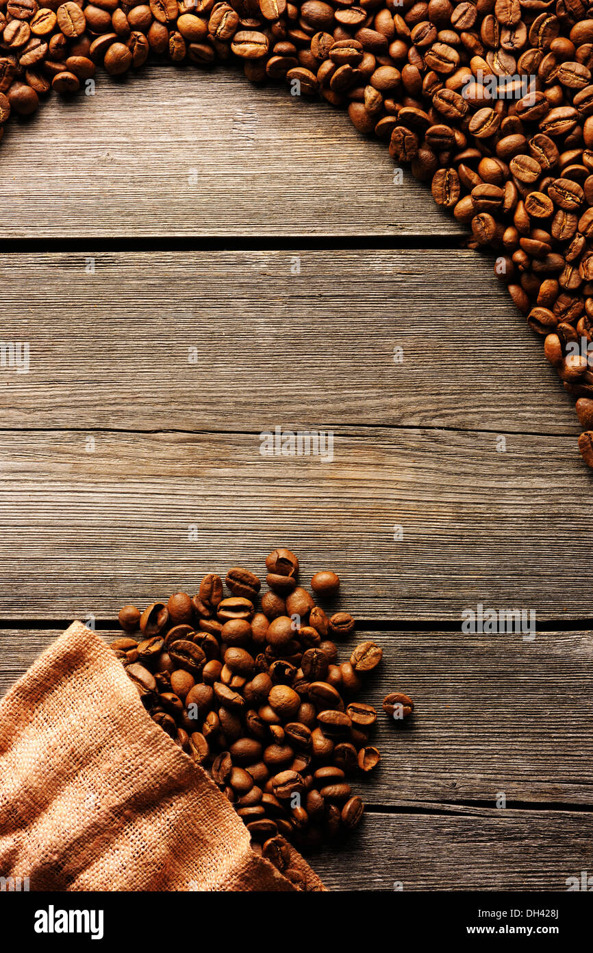 Coffee beans and bag background Stock Photo - Alamy