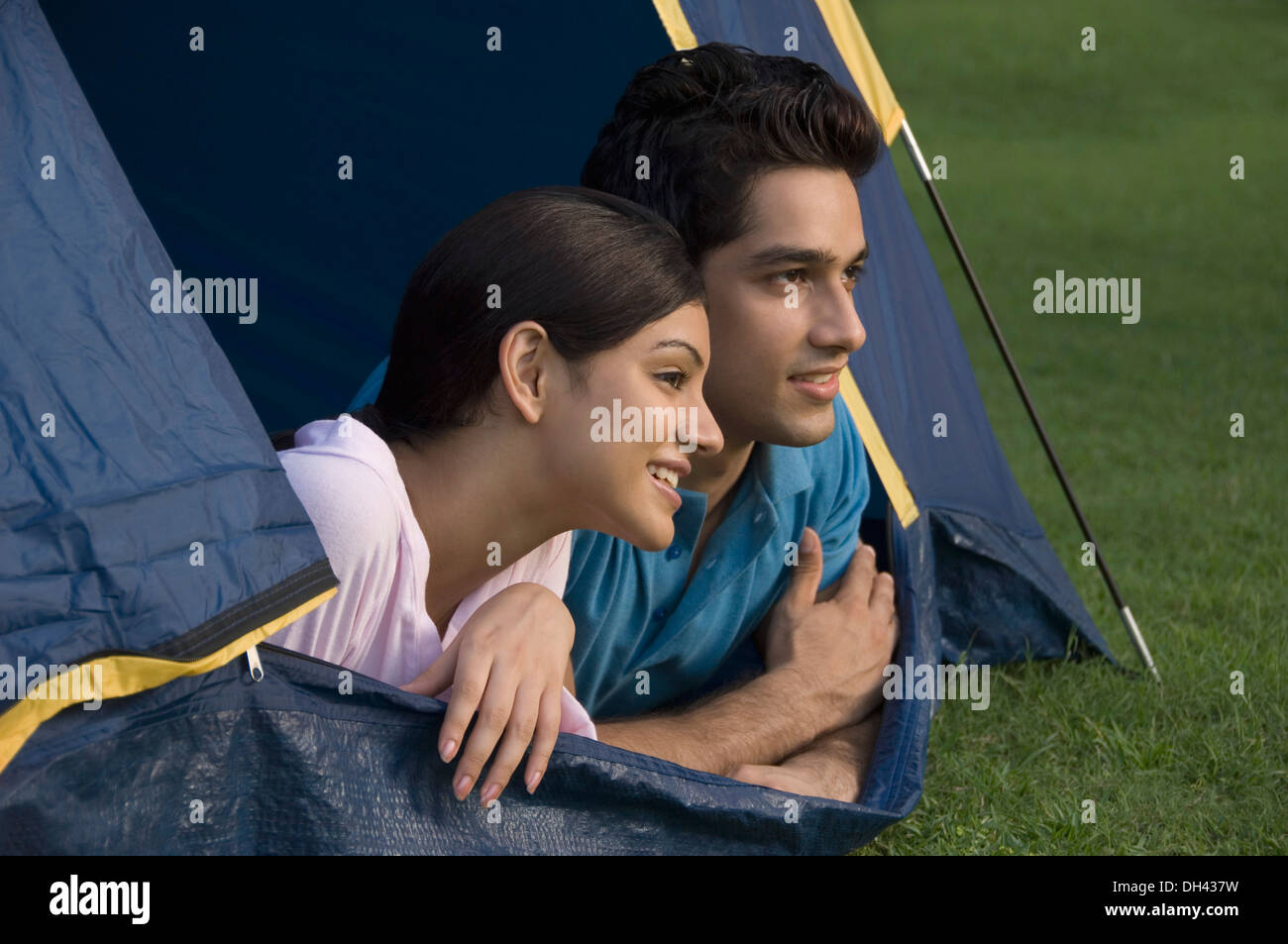Couple lying in a tent Stock Photo