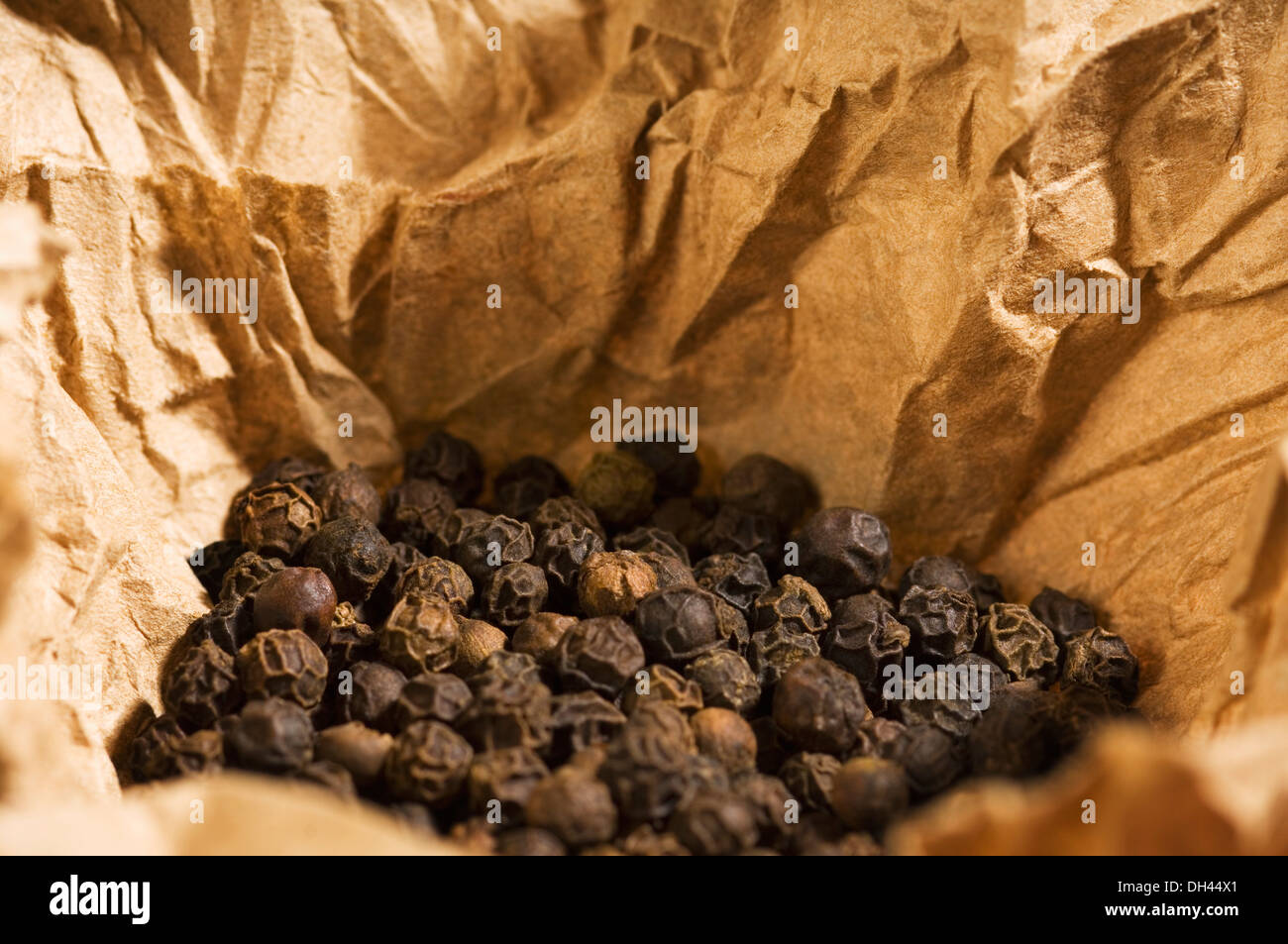 Black peppercorns in a paper Stock Photo Alamy