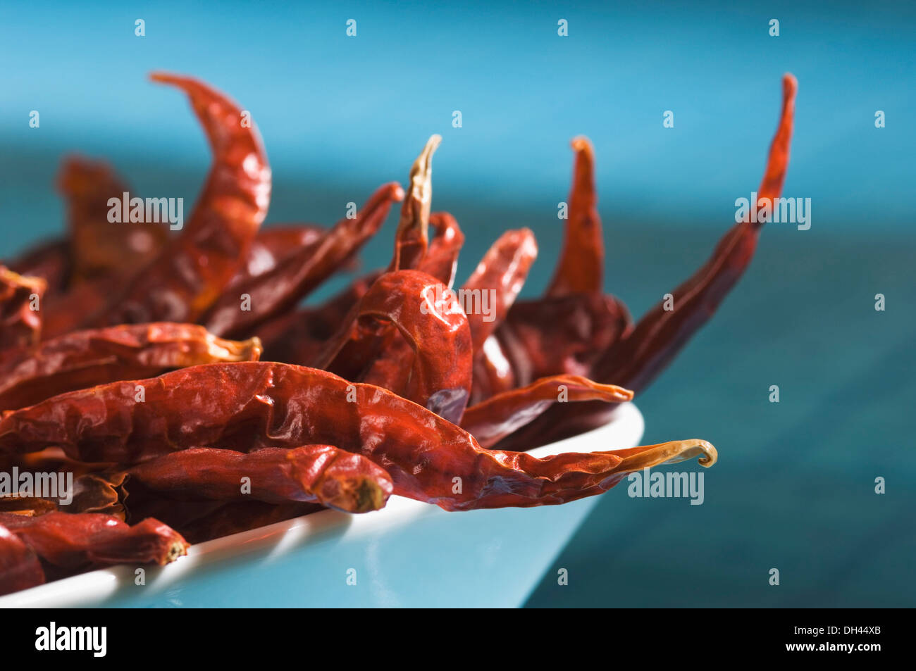 Red chili peppers in a bowl Stock Photo - Alamy