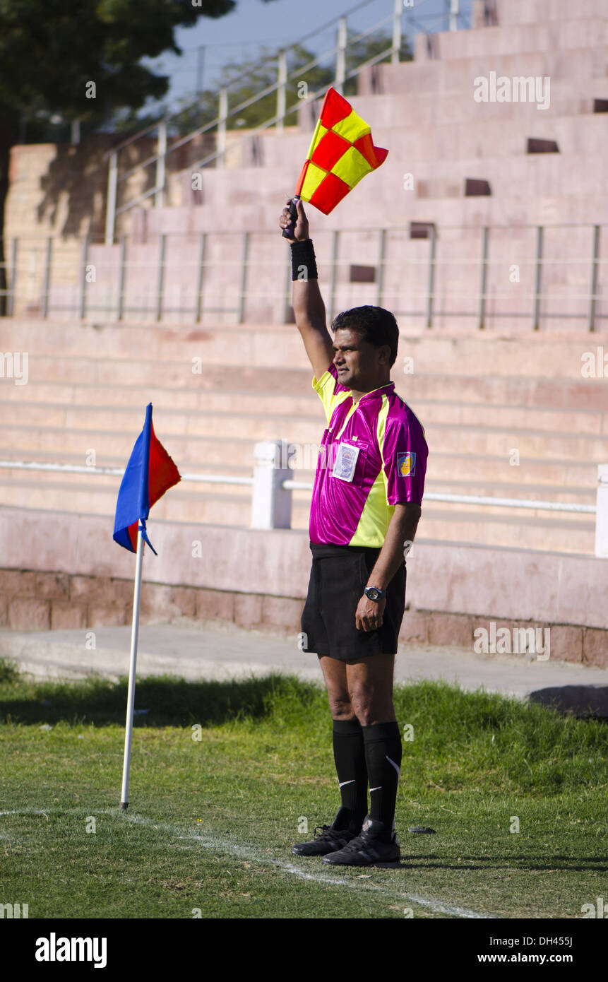 Soccer football game , referee showing flag , india , asia ,   MR#786 Stock Photo