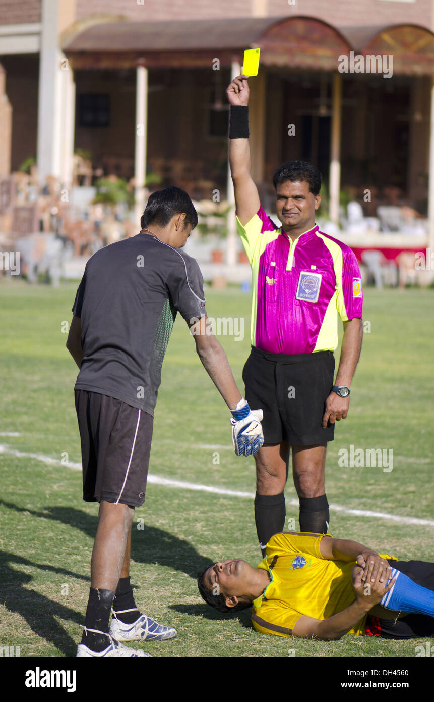 Referee showing yellow card   MR#786 Stock Photo