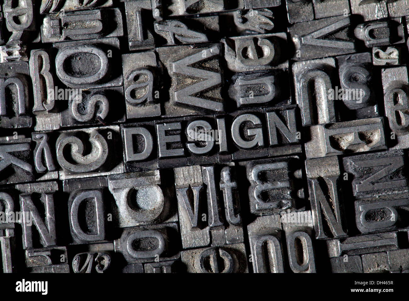 Old lead letters forming the word DESIGN Stock Photo - Alamy