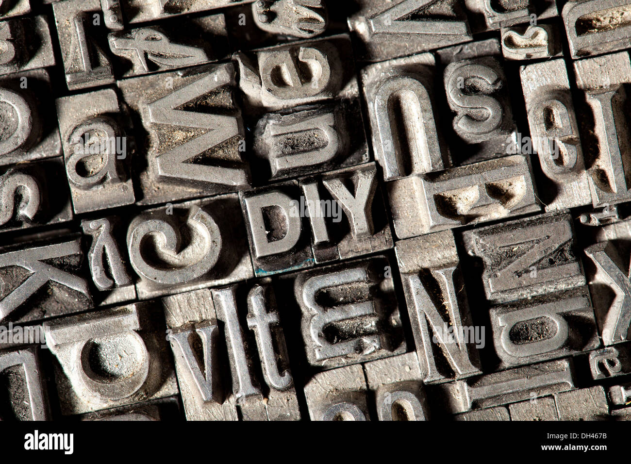 Old lead letters forming the term DIY Stock Photo Alamy