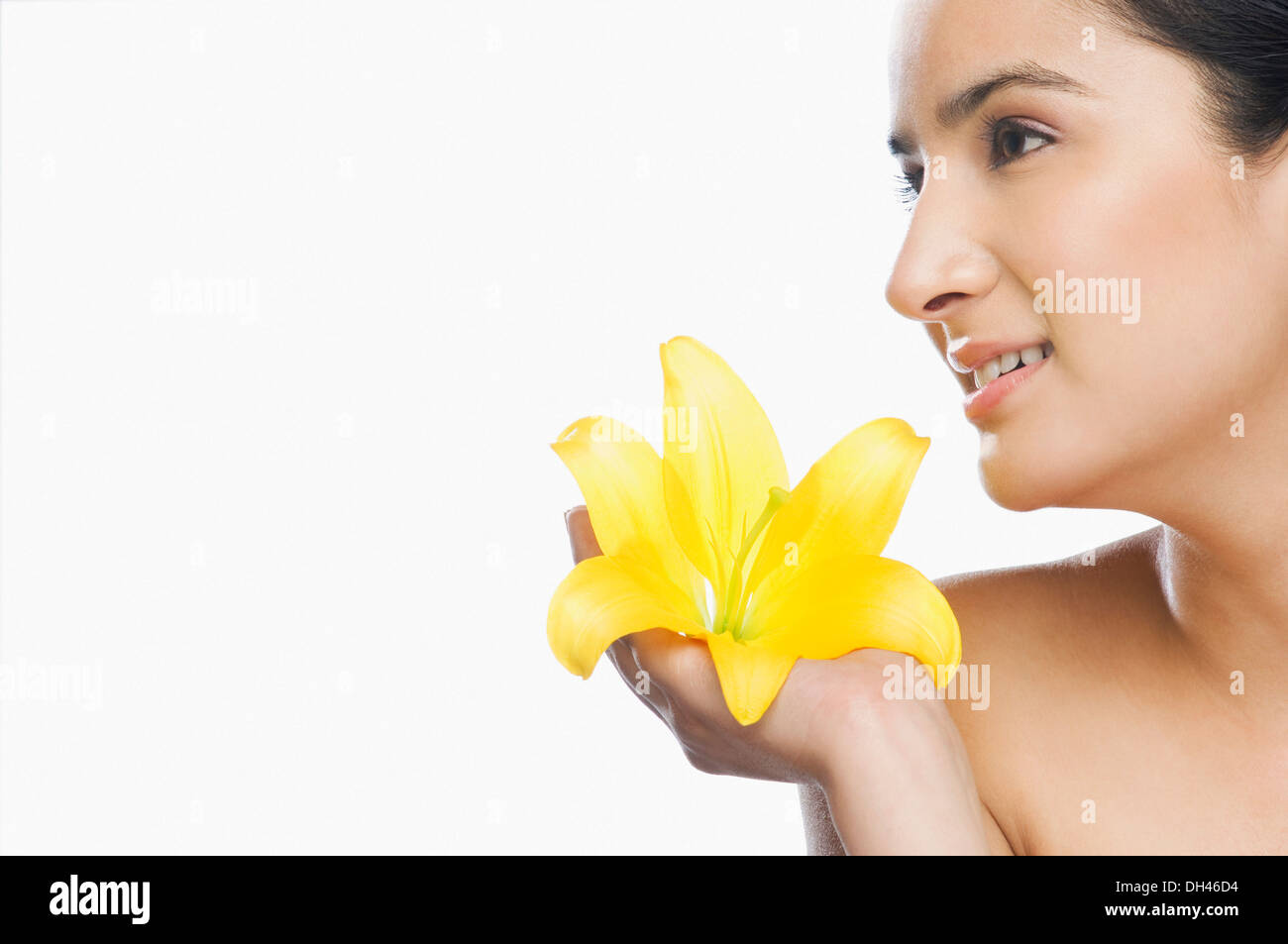Woman holding a flower Stock Photo