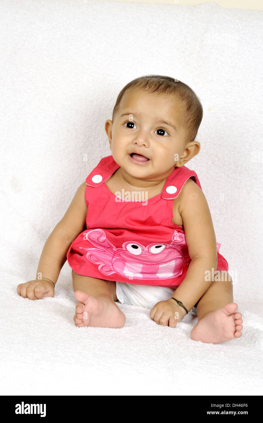 Baby Sitting on White Background   MR#736LA Stock Photo