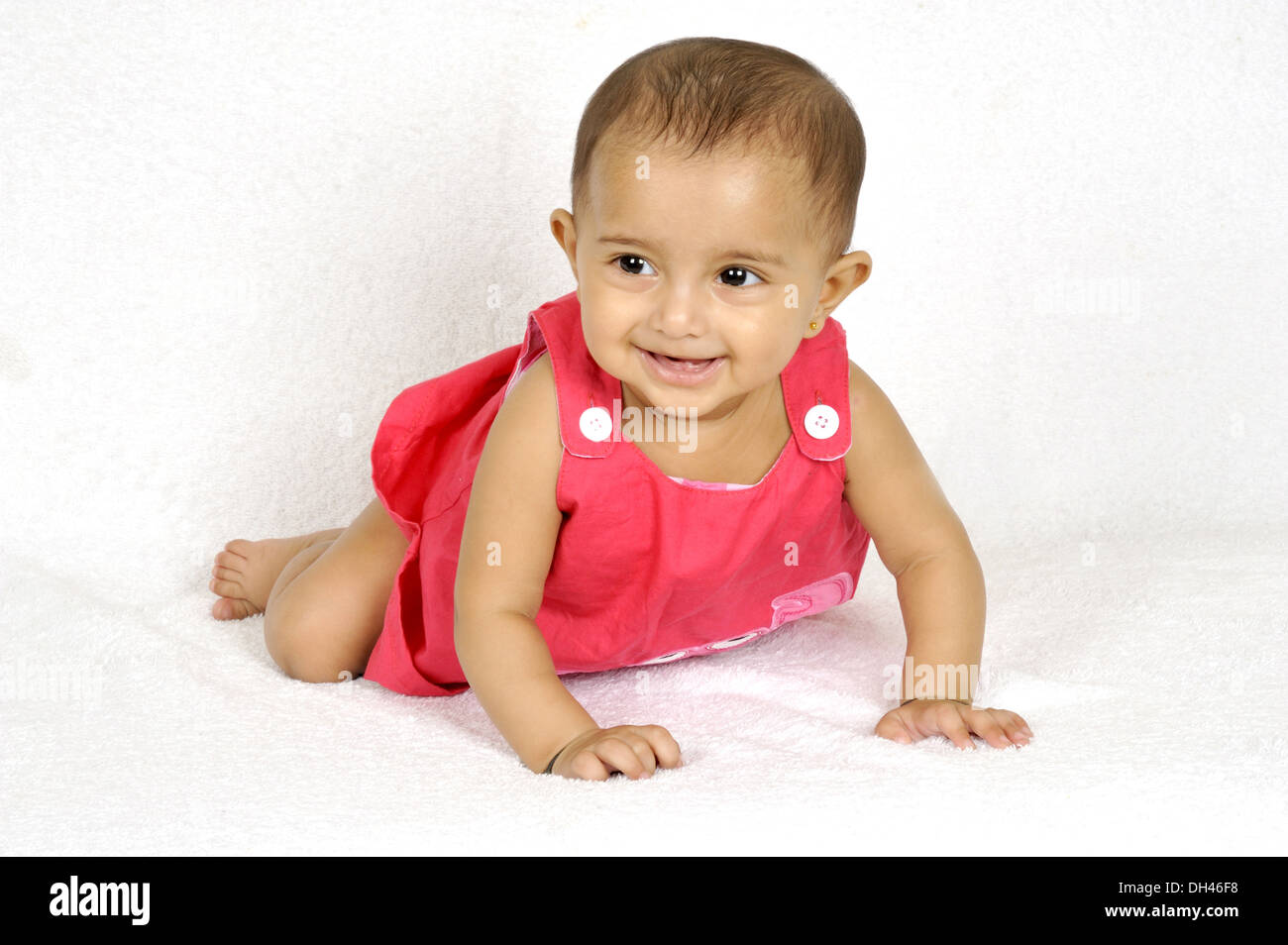 Indian Baby Crawling on White Background - Model Released # 736LA Stock Photo