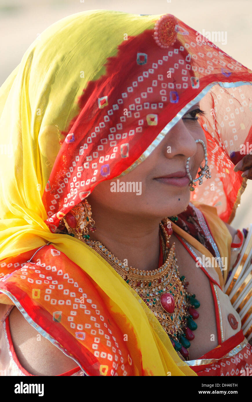 Indian woman in Rajasthani costume saree necklace nose ring Jaisalmer