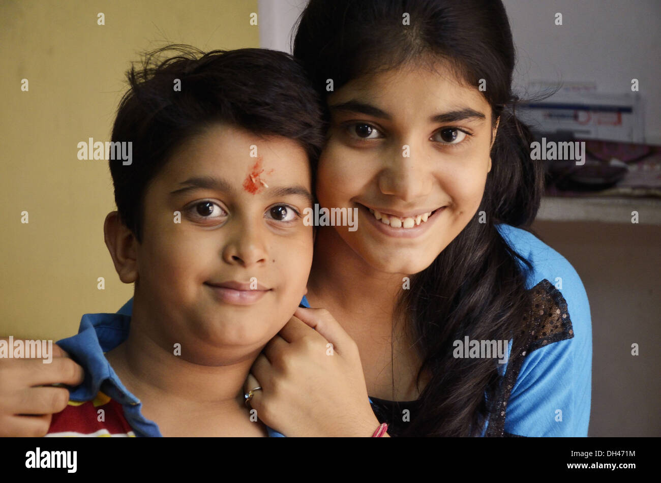 Brother and sister posing after celebrating rakhi raksha bandhan Stock