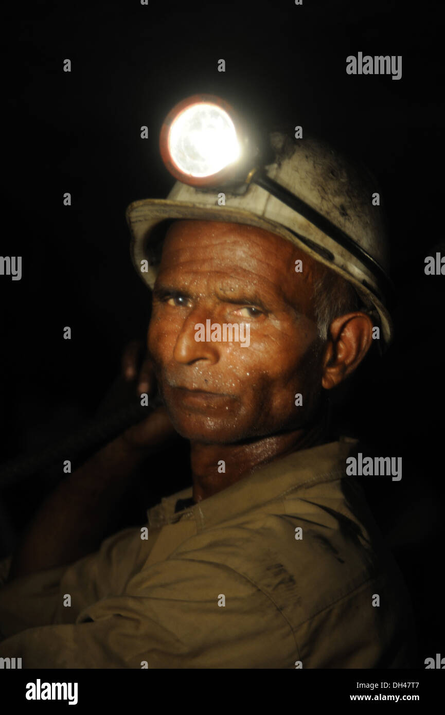 coal miner helmet with light india Stock Photo