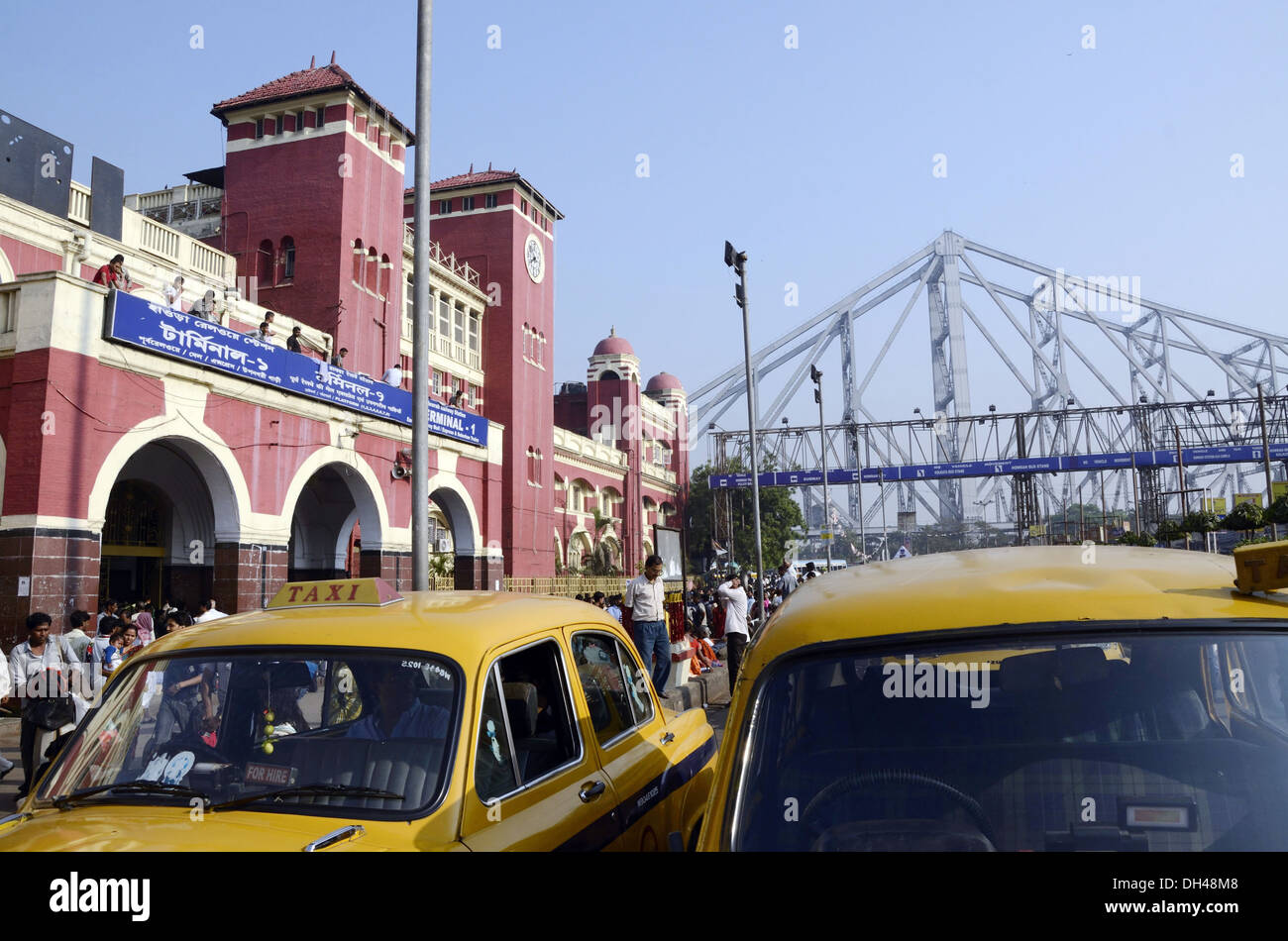 howrah railway station and Howrah Bridge at Kolkata India Stock Photo