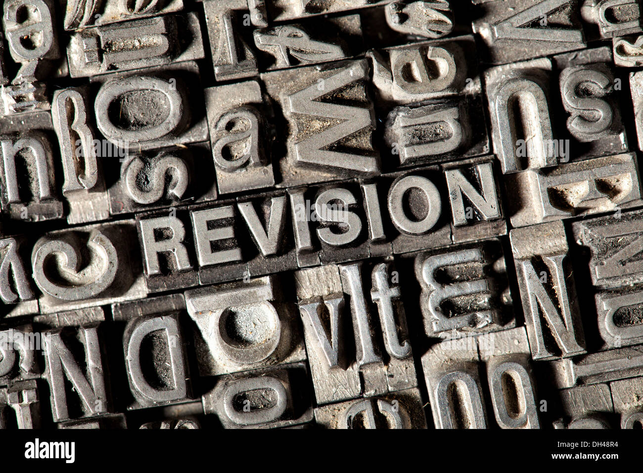 Old lead letters forming the word REVISION Stock Photo