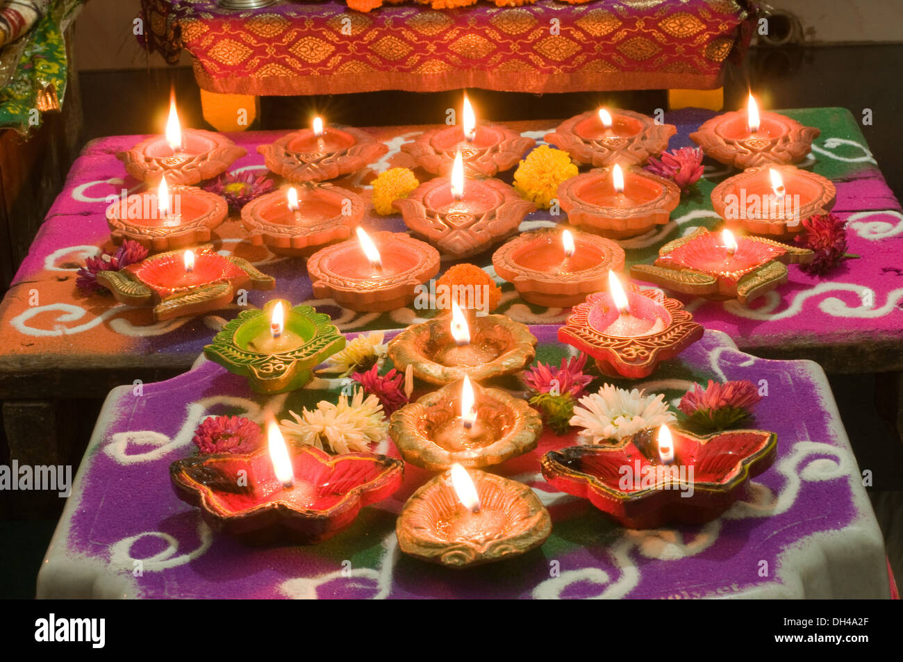 Oil lamps burning Diwali festival of lights Pune Maharashtra India Nove 2011 Stock Photo