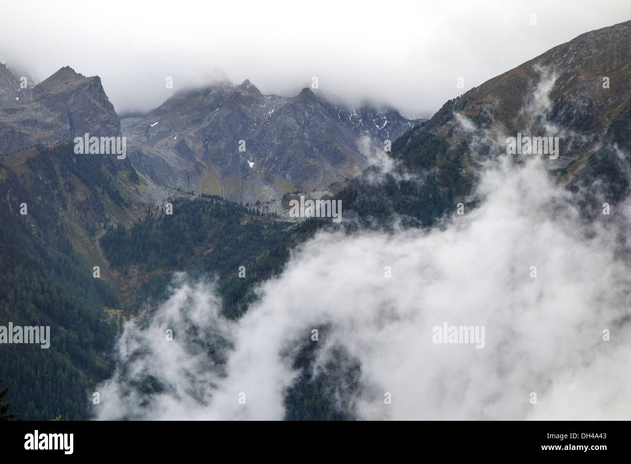 Clouds in the mountains, bad weather Stock Photo