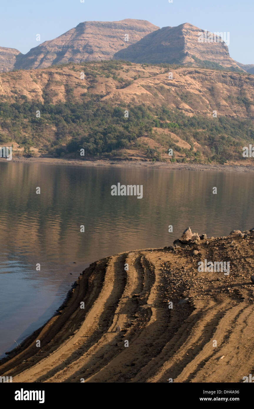 Dry mountains and lake in Bhandardara Maharashtra India Asia Feb 2012 Stock Photo
