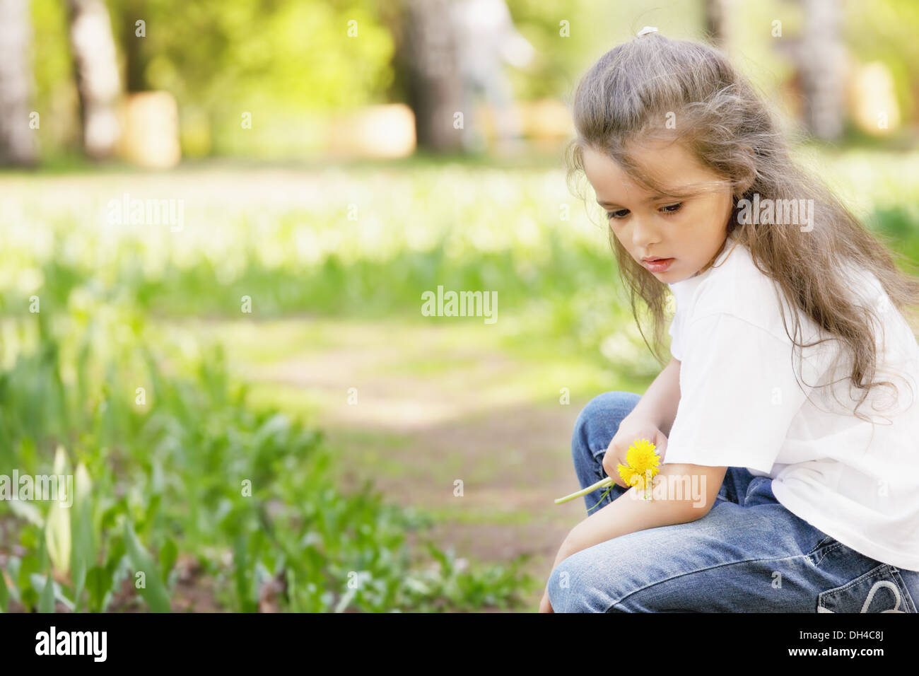 Girl with dandelion Stock Photo - Alamy