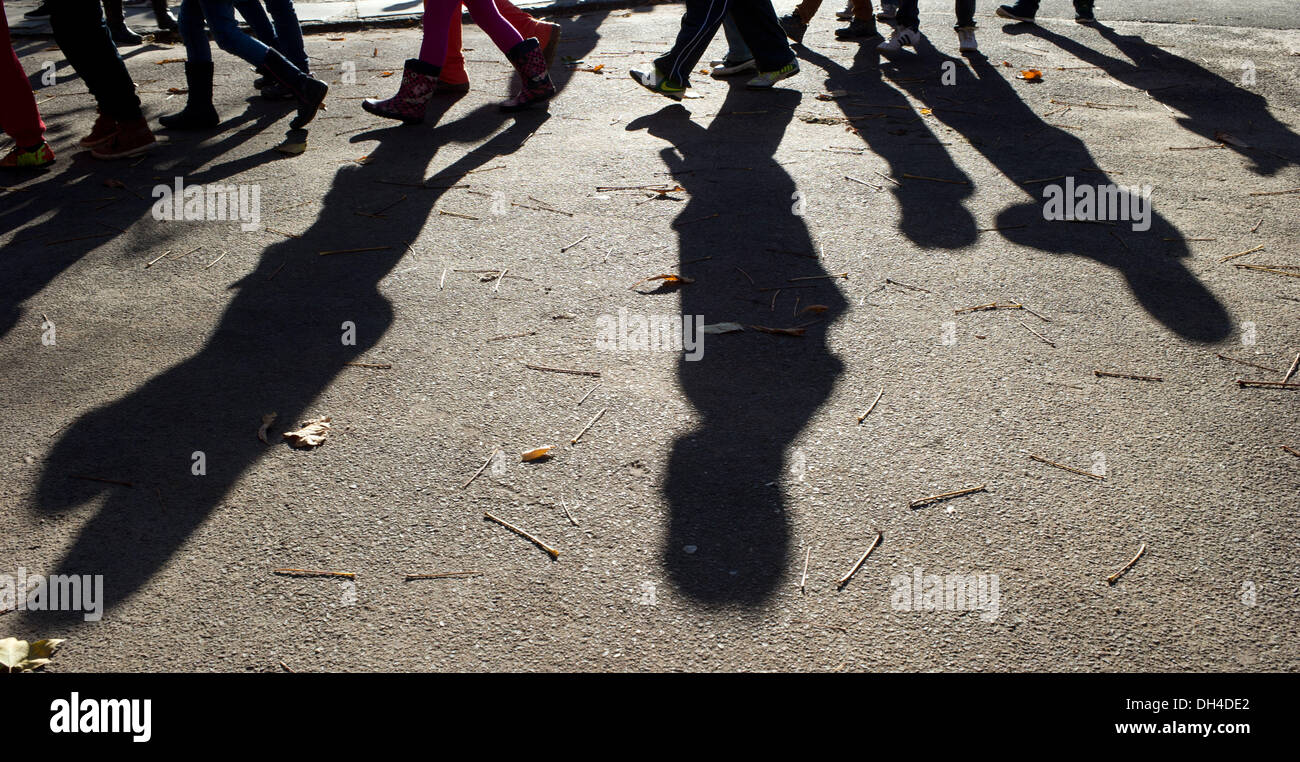 Long Shadow Child Berlin, Germany. 31st Oct, 2013. Little children cast long shadows on a ...