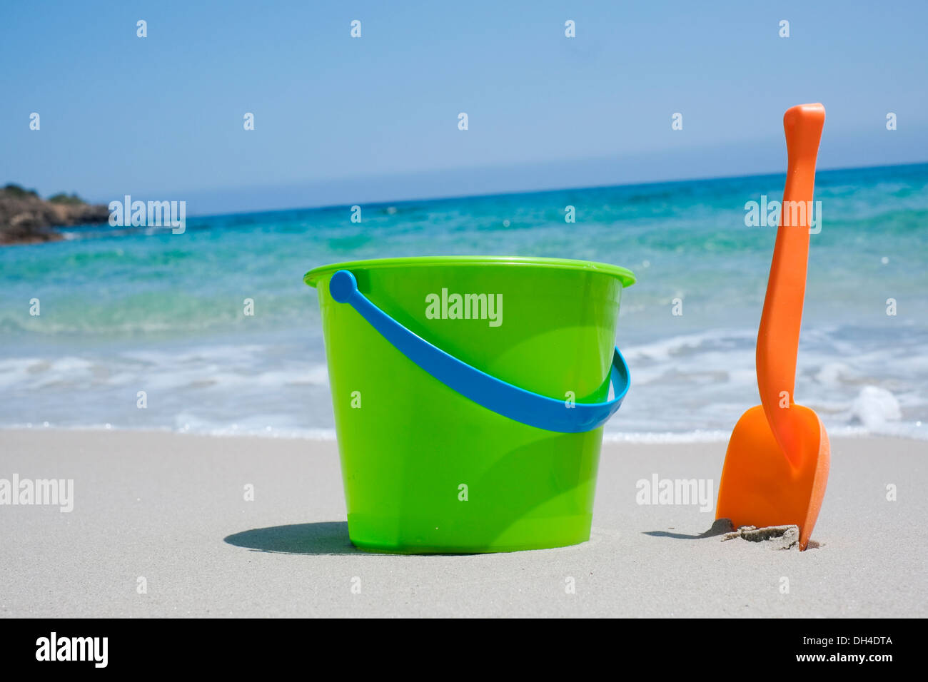 Bucket and shovel on a sandy beach Stock Photo Alamy