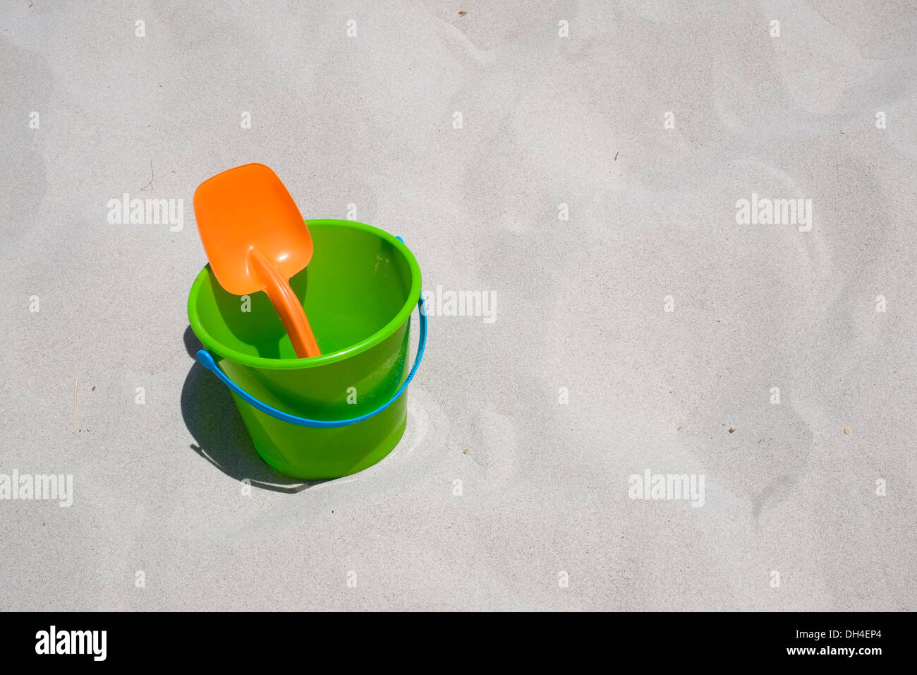 Bucket and shovel on a sandy beach Stock Photo Alamy