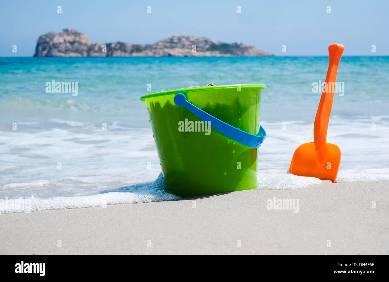 Bucket and shovel on a sandy beach Stock Photo Alamy