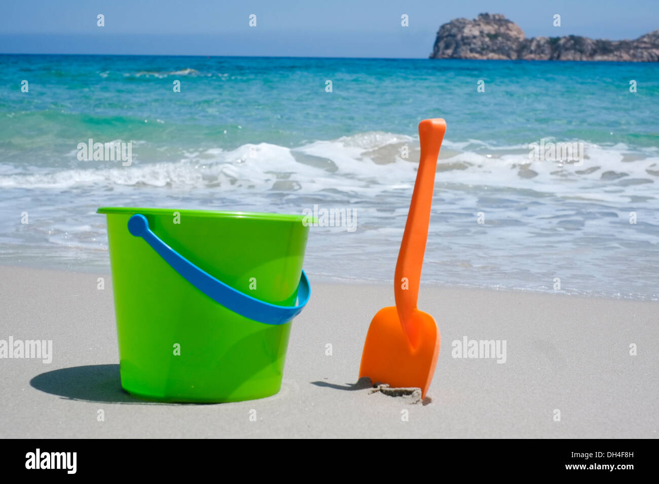 Bucket and shovel on a sandy beach Stock Photo Alamy