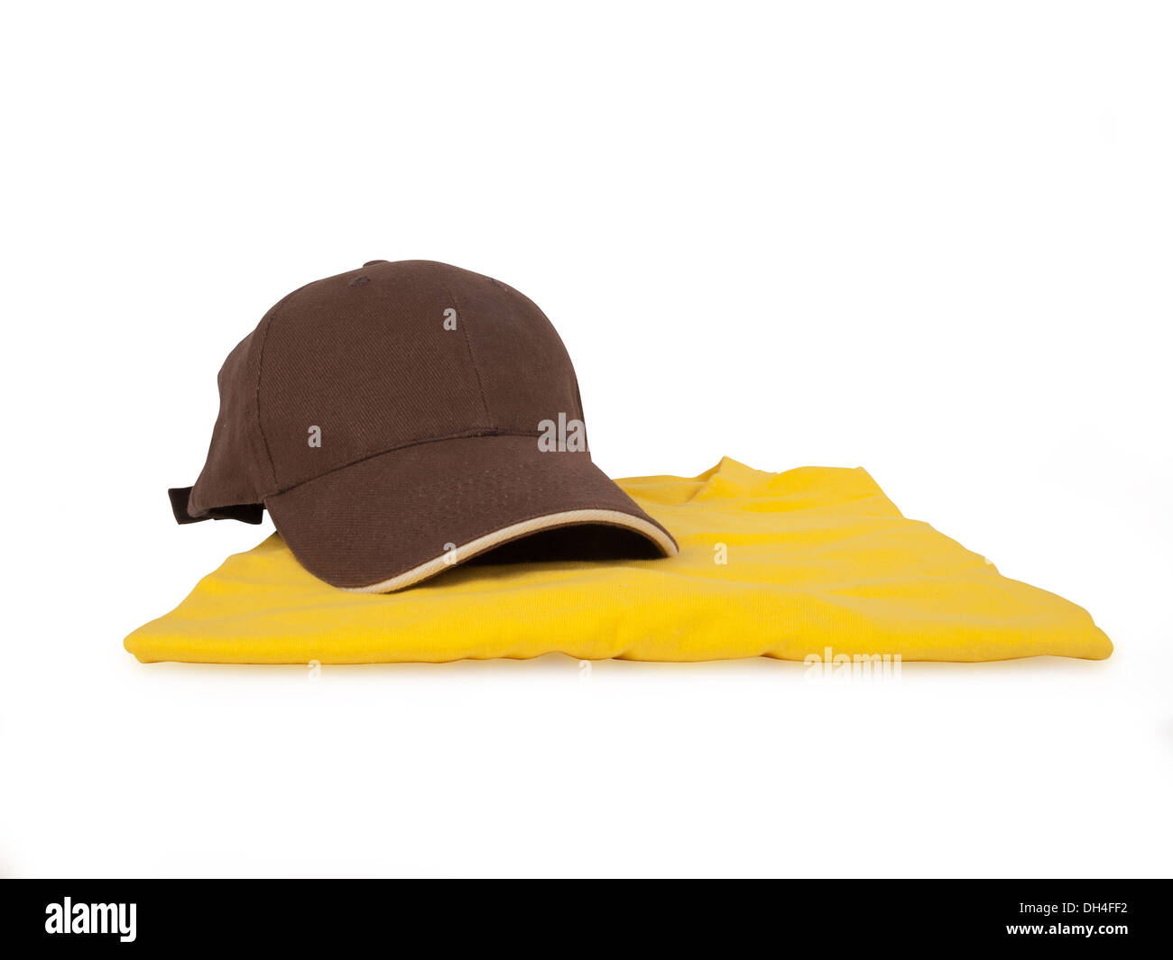 brown baseball cap and yellow t shirt Stock Photo