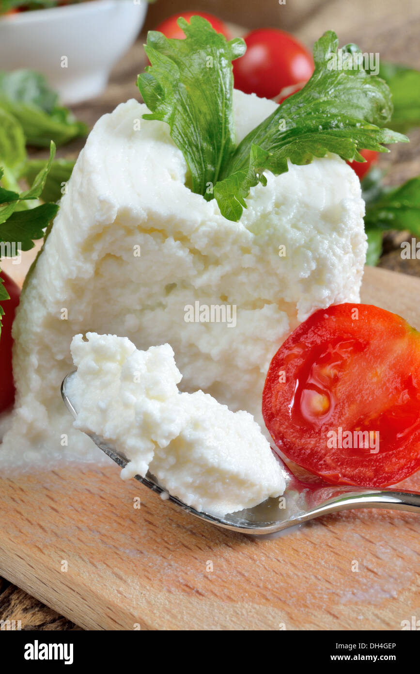 Fresh Cheese Examples italian fresh cheese called ricotta with tomatoes and parsley Stock ...