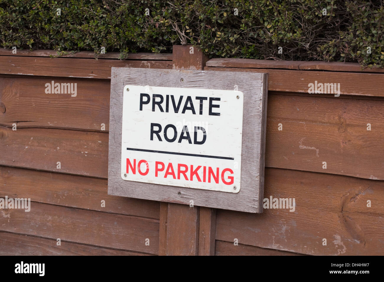 Sign. Private Road, No Parking. On a Garden fence. Norfolk. England. UK . Stock Photo