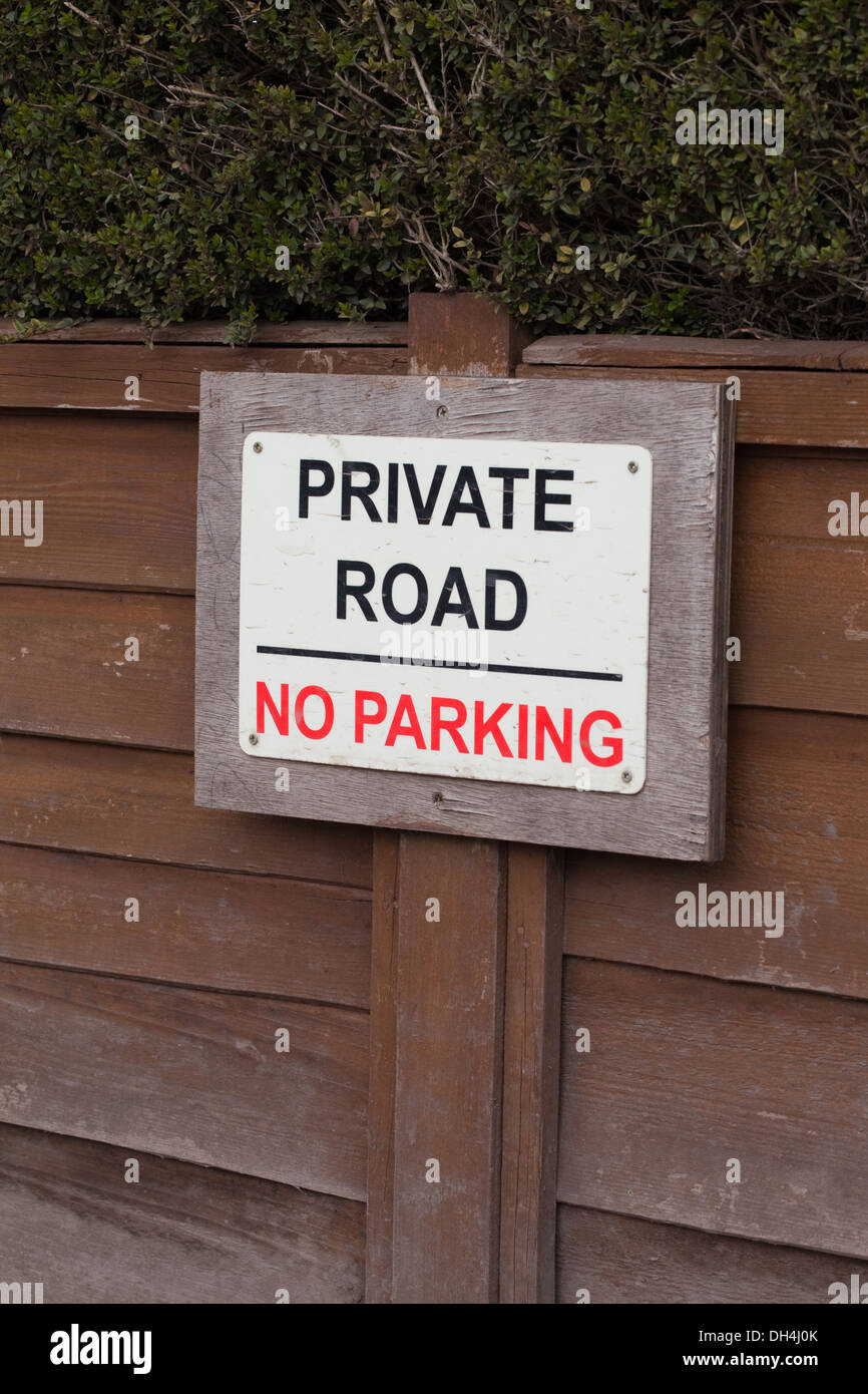 Sign. Private Road, No Parking. Garden Fence, Norfolk. England. UK . Stock Photo