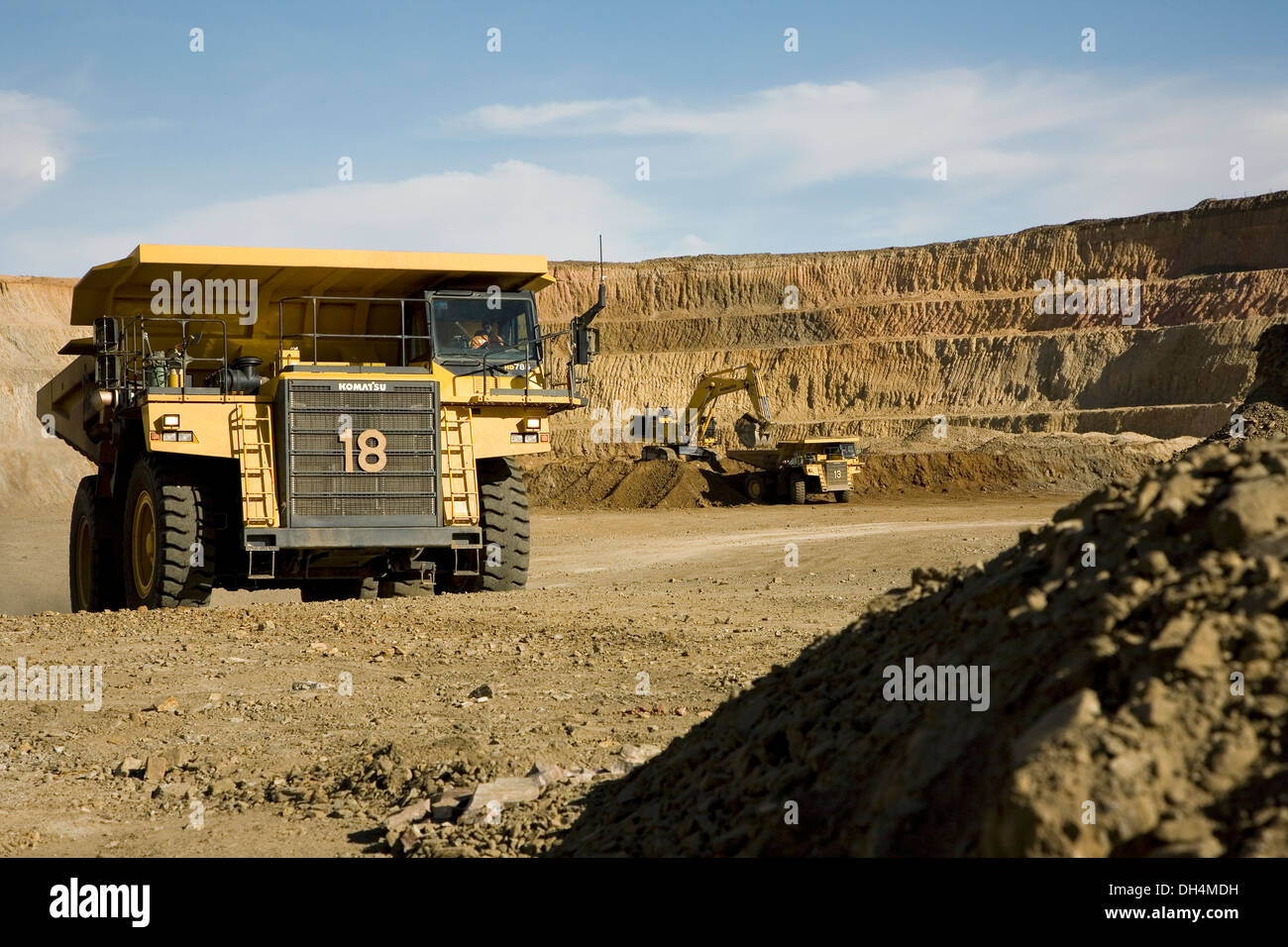 Gold mine operation in open cast surface pit with large haul truck ...