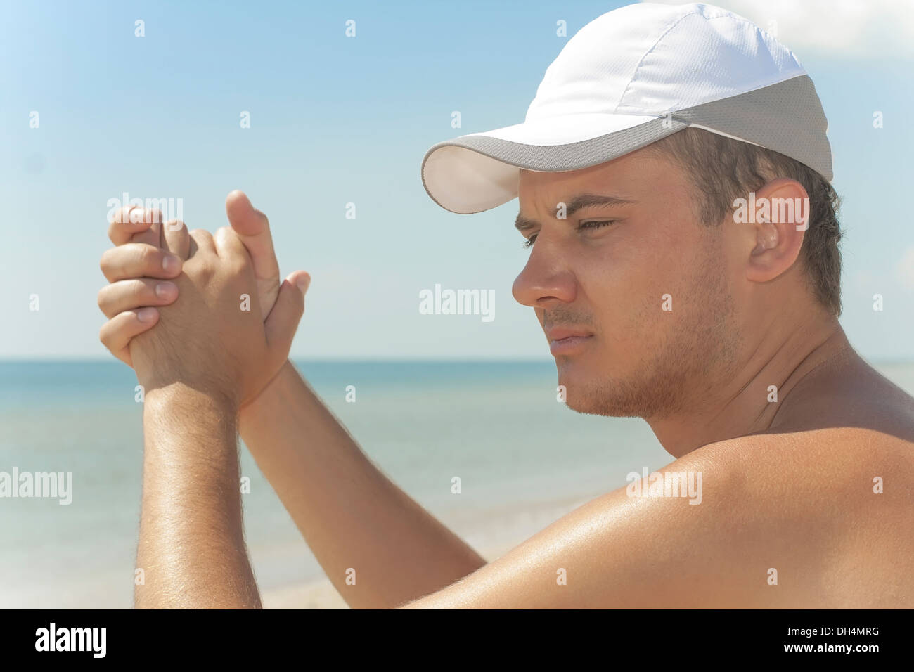 Man sitting on shore sea hi-res stock photography and images - Alamy