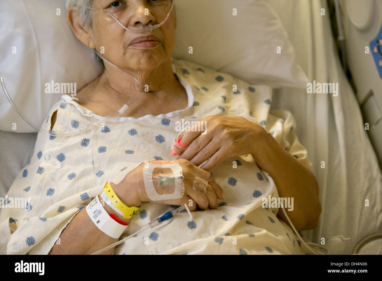 74 year old Hispanic senior woman in hospital bed Stock Photo - Alamy