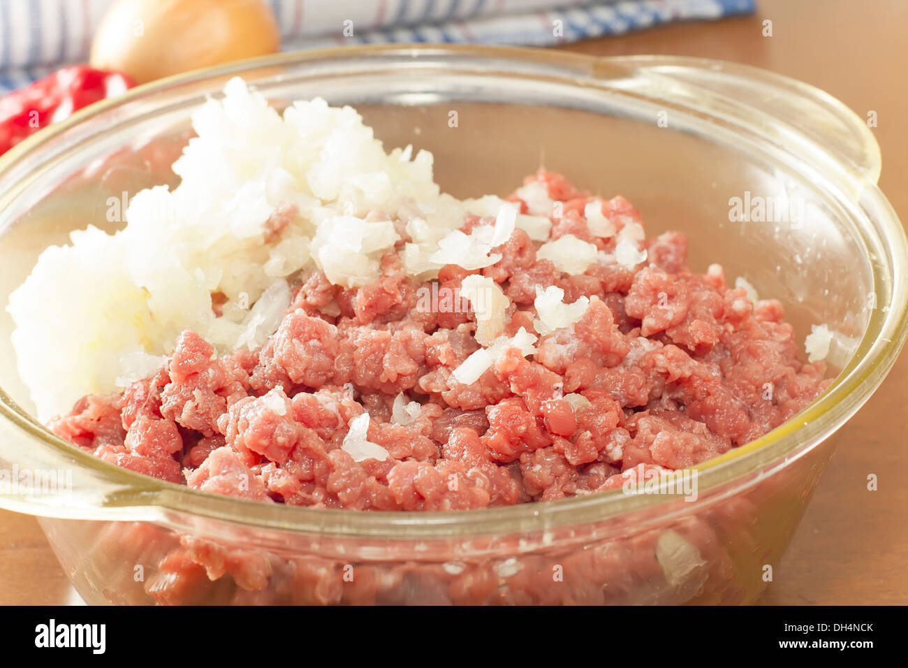 mince raw beef with onions in a glass bowl Stock Photo Alamy